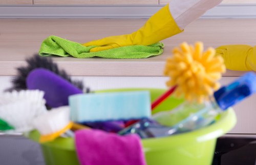 Cleaner preparing equipment for safe carpet cleaning in Bethnal Green