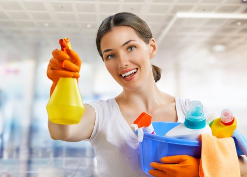 Carpet cleaning team preparing equipment safely